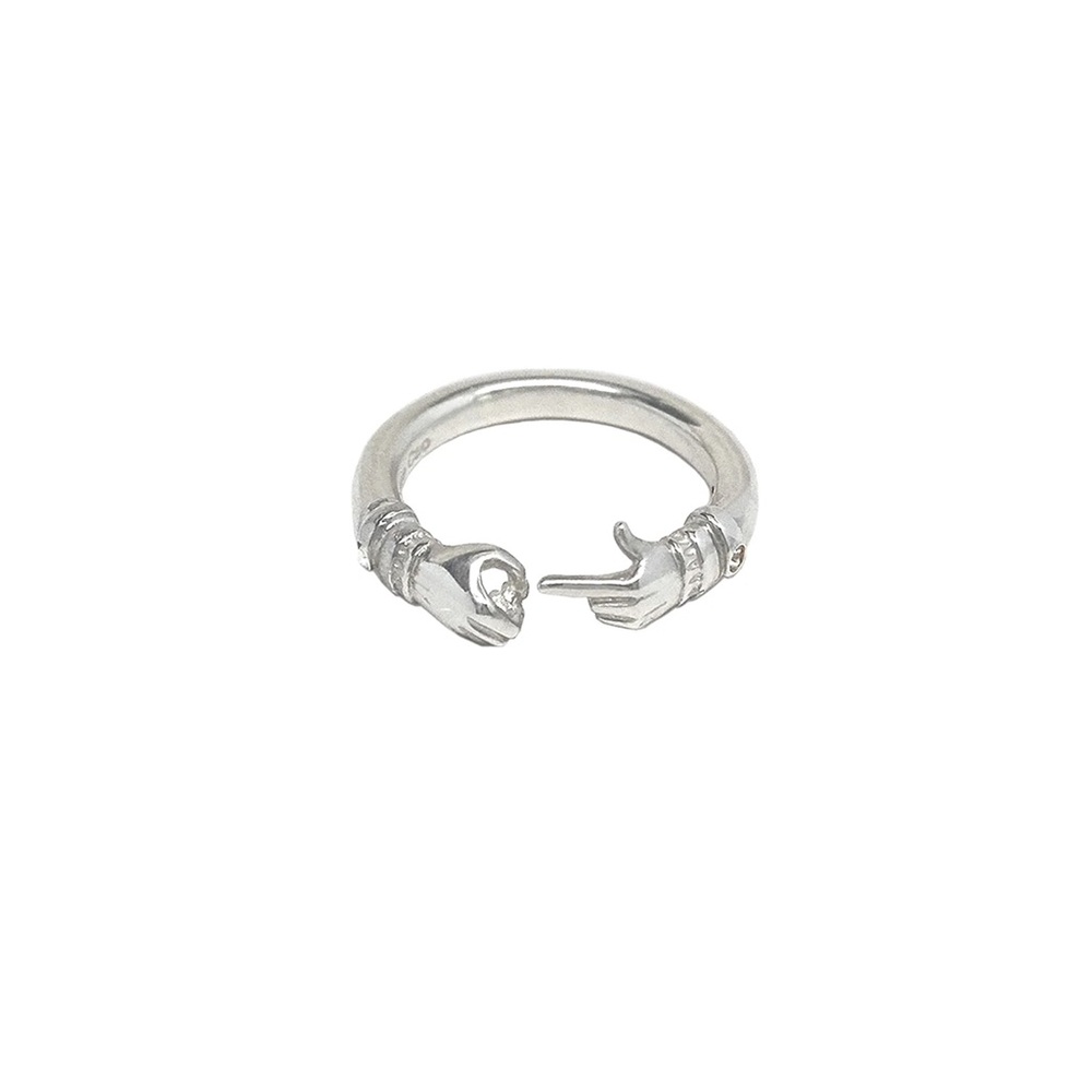 Queenie Cao silver pointing gesture emoji ring
